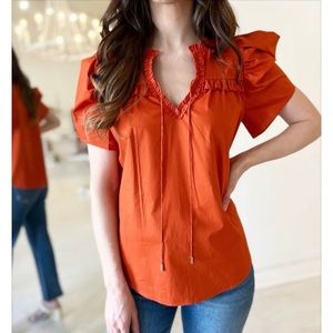 Anna Cate Abigail burnt orange puff sleeve Blouse. NWOT